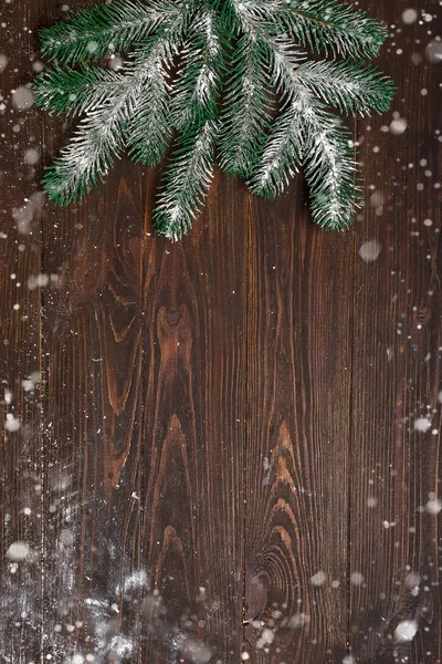 Christmas fir tree with decoration on dark wooden board. with copy space for text. Christmas mock-up or greeting card — Stock Photo, Image