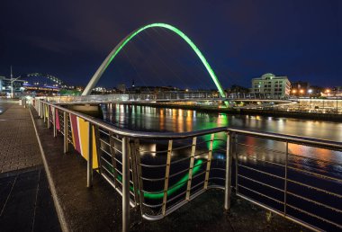 Gateshead Millennium Bridge across the Tyne River between Newcastle and Gateshead clipart