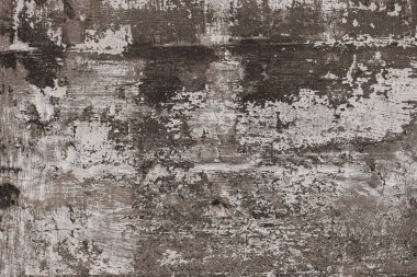 Soyut grunge arka plan. Çizikler, çatlaklar ve boya artıkları ile beton duvar. Sürtünmeler, delikler ve renk tonu.