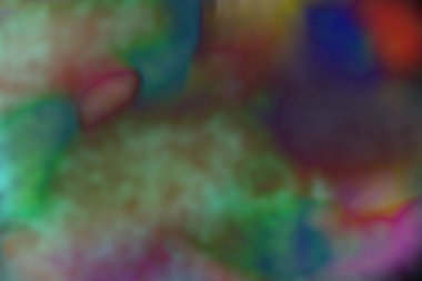 Soyut arkaplan. Renkli, karman çorman asit lekeleri. Gaz yanığı.