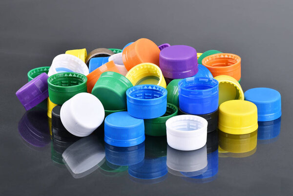 Multicolor Caps and Closure for Water and CSD