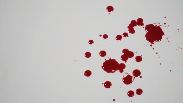 血滴在白色表面 — 图库视频影像