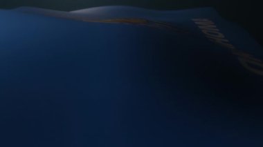 Oklahoma bayrağı ağır çekimde karanlık bir atmosferde dalgalanıyor. Sonsuz döngü.