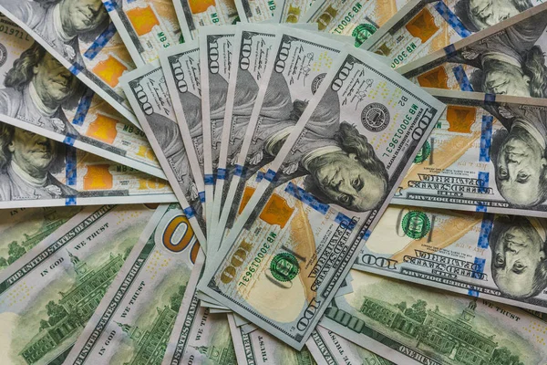 Arkaplanda dolar ve para var.