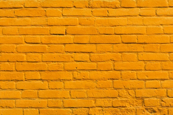 tuğla kırmızı duvar. Eski bir tuğla evin arka planı.