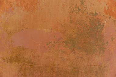 Soyut boya dokusuna sahip beton bir arka plan. Eski turuncu boyalı duvarın arka planı. Roma duvar dokusu arka planı, Roma İtalya