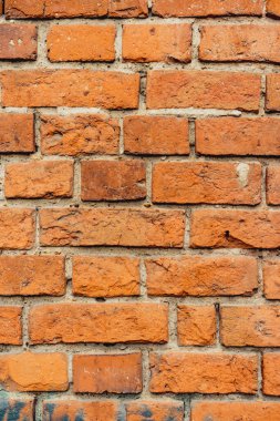 Tuğla kırmızı duvar dokusu. Eski bir tuğla evin arka planı.