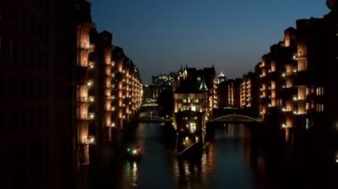 Aerial Night Speicherstadt in Hamburg Germany, is the largest warehouse area in the world, where buildings stand on a pile foundation