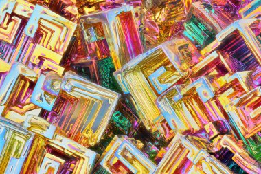 Amazing colorful rainbow Bismuth Gemstone Crystals with shallow depth of field macro closeup texture as background clipart