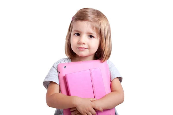 Kleines Mädchen mit Tablet, iPad, PC und Notizbuch, Tagebuch auf weißem Hintergrund — Stockfoto