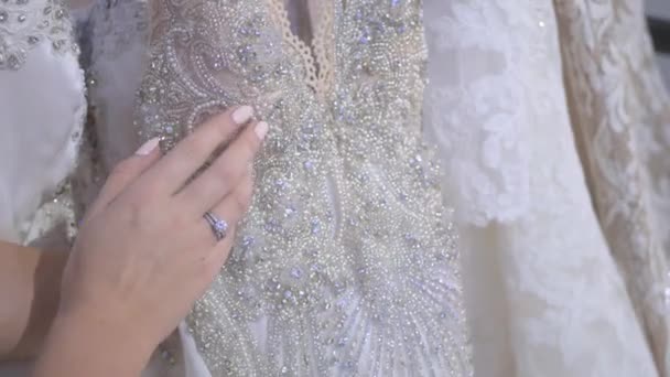Close Camera Focuses White Wedding Gown Camera Slowly Moving Beautiful — Stock Video