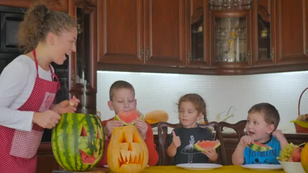 Video Mother Children Kitchen Halloween Party Showing Thumbs — Stock Video