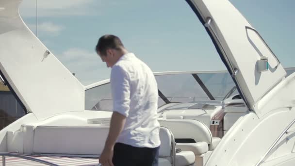 Salesman Show Yacht Buyer Young Man Ask Details Purchase Characteristics — Stock Video