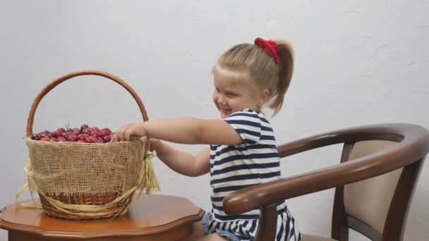 Cute Little Girl Sits Chair White Wall Background Pretty Girl — Stockvideo