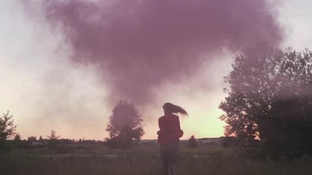 Blond Young Lady Running Away Violet Smoke Girl Hair Fluttering — Stock Video