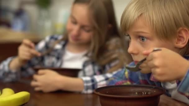 Portrait Cute Children Eating Cereals Kitchen Morning Healthy Tasty Breakfast — Stock Video