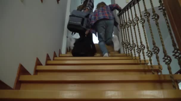 Boy Girl Rising Stairs Backpacks Siblings Just Back Home School — 图库视频影像