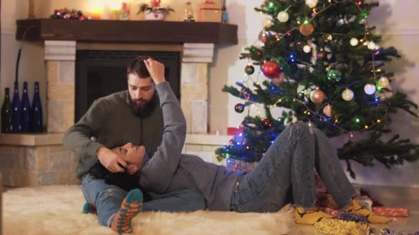 Young Pretty Couple Lying Christmas Tree Together New Year Christmas — Stock Video