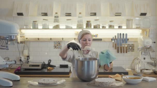 Woman Uniform Black Gloves Stand Modern Kitchen Many Kitchen Utensils — Stock Video