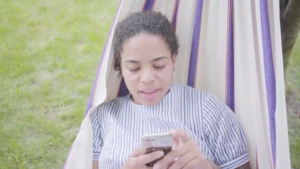 Portrait Adorable Young African American Woman Lying Hammock Relaxing Garden — Stock Video