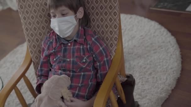 Boy Swaying Armchair Holding Soft Toy Table Pills Video — Wideo stockowe