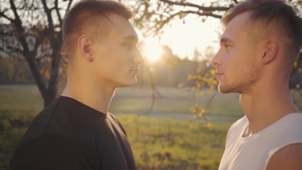 Close Two Caucasian Boys Looking Each Other Sunlight Adult Sportsmen — 图库视频影像