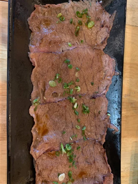 Beef burn on dish background — Stock Photo, Image