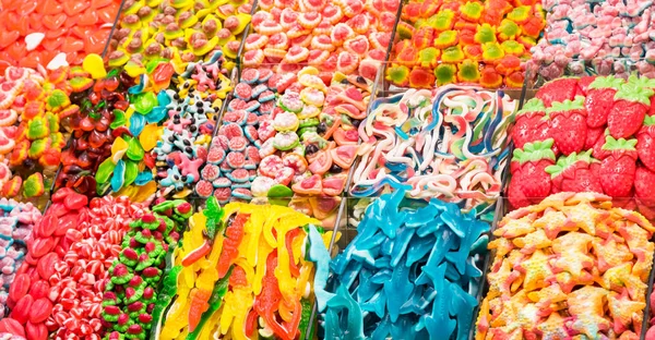 Variety of loose candies exposed in a stall — Stock Photo, Image