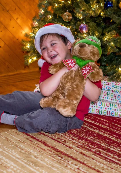 Boy and new teddy bear — Stock Photo, Image