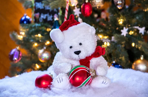 Tiny white teddy bear with holiday cheer — Stock Photo, Image