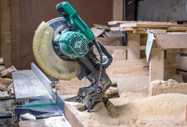 Chop saw in a wood workers shop — Stock Photo, Image