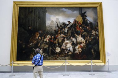Visitors take a tour at the Royal Museums of Fine Arts of Belgium in Brussels on June 1st, 2019. clipart