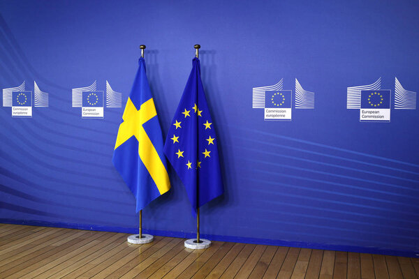 Brussels, Belgium. 5th March 2019. Flag of EU and Sweden stand in European commission offices .