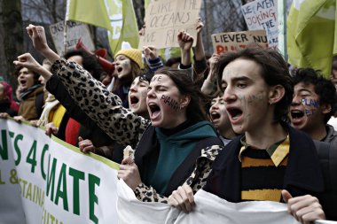 Göstericiler B iklim değişikliğine karşı bir protesto katılmak