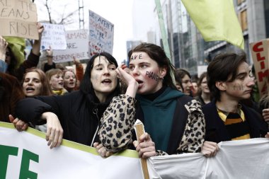 Göstericiler B iklim değişikliğine karşı bir protesto katılmak
