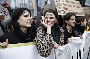 Göstericiler B iklim değişikliğine karşı bir protesto katılmak