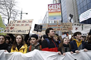 Göstericiler B iklim değişikliğine karşı bir protesto katılmak