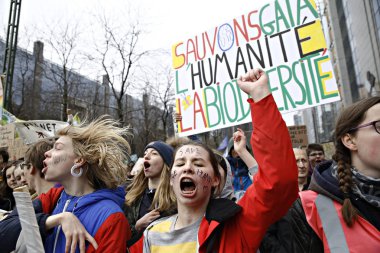 Göstericiler B iklim değişikliğine karşı bir protesto katılmak