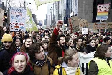 Göstericiler B iklim değişikliğine karşı bir protesto katılmak