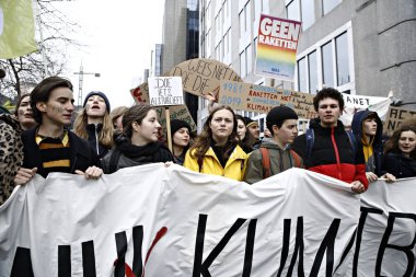 Göstericiler B iklim değişikliğine karşı bir protesto katılmak