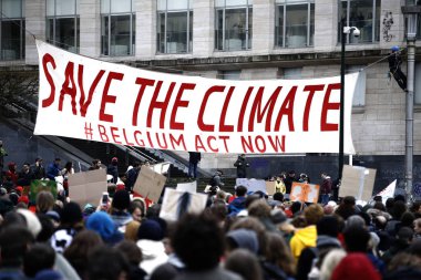 Göstericiler B iklim değişikliğine karşı bir protesto katılmak
