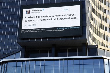 A billboard on the side of a building referring to Brexit and Br clipart