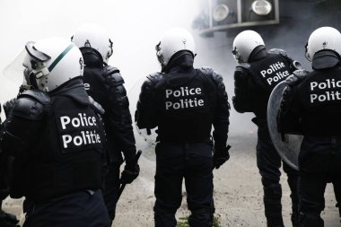16 Aralık 2018'de Belçika'nın Başkenti Brüksel'de Marakeş Göç Paktı'nı protesto eden aşırı sağcı lar çevik kuvvetle çatıştı.
