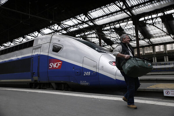 Paris, France Mar. 22 2018.A man walks on a platform after a commuter train arrived at Gare de Lyon railway station during a nationwide strike by French SNCF railway workers
