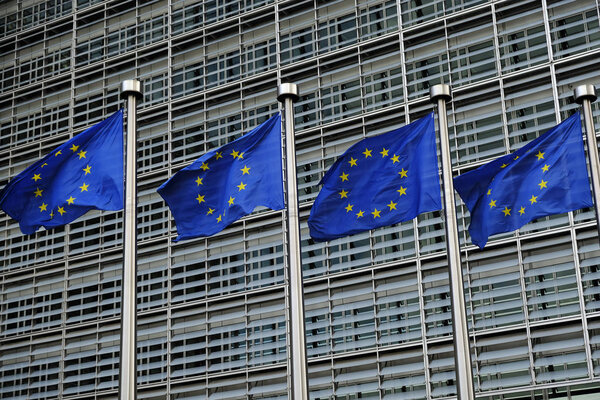 European flags flap in the wind outside EU headquarters in Brussels, Belgium on Oct. 31, 2018