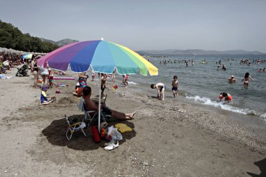 Summer Snapshots, Atina/