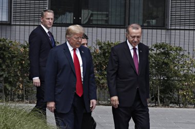 ABD Başkanı Donald Trump ve Türkiye Cumhurbaşkanı Recep Tayyip Erdoğan, 11 Temmuz 2018'de Belçika'nın başkenti Brüksel'de düzenlenen NATO askeri ittifakı zirvesinin açılış töreninde görüntülendi.