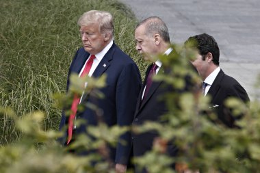 US President Donald Trump and President of Turkey Recep Tayyip Erdogan pictured during the opening ceremony of the summit of the NATO military alliance on July 11, 2018, in Brussels, Belgium clipart