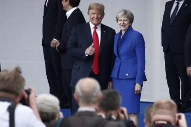 11 Temmuz 2018 - Brüksel, Belçika - ABD Başkanı Donald J. Trump ve İngiltere Başbakanı Theresa May, Belçika'nın başkenti Brüksel'de düzenlenen NATO Zirvesi 2018'de.