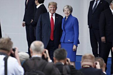 11 Temmuz 2018 - Brüksel, Belçika - ABD Başkanı Donald J. Trump ve İngiltere Başbakanı Theresa May, Belçika'nın başkenti Brüksel'de düzenlenen NATO Zirvesi 2018'de.